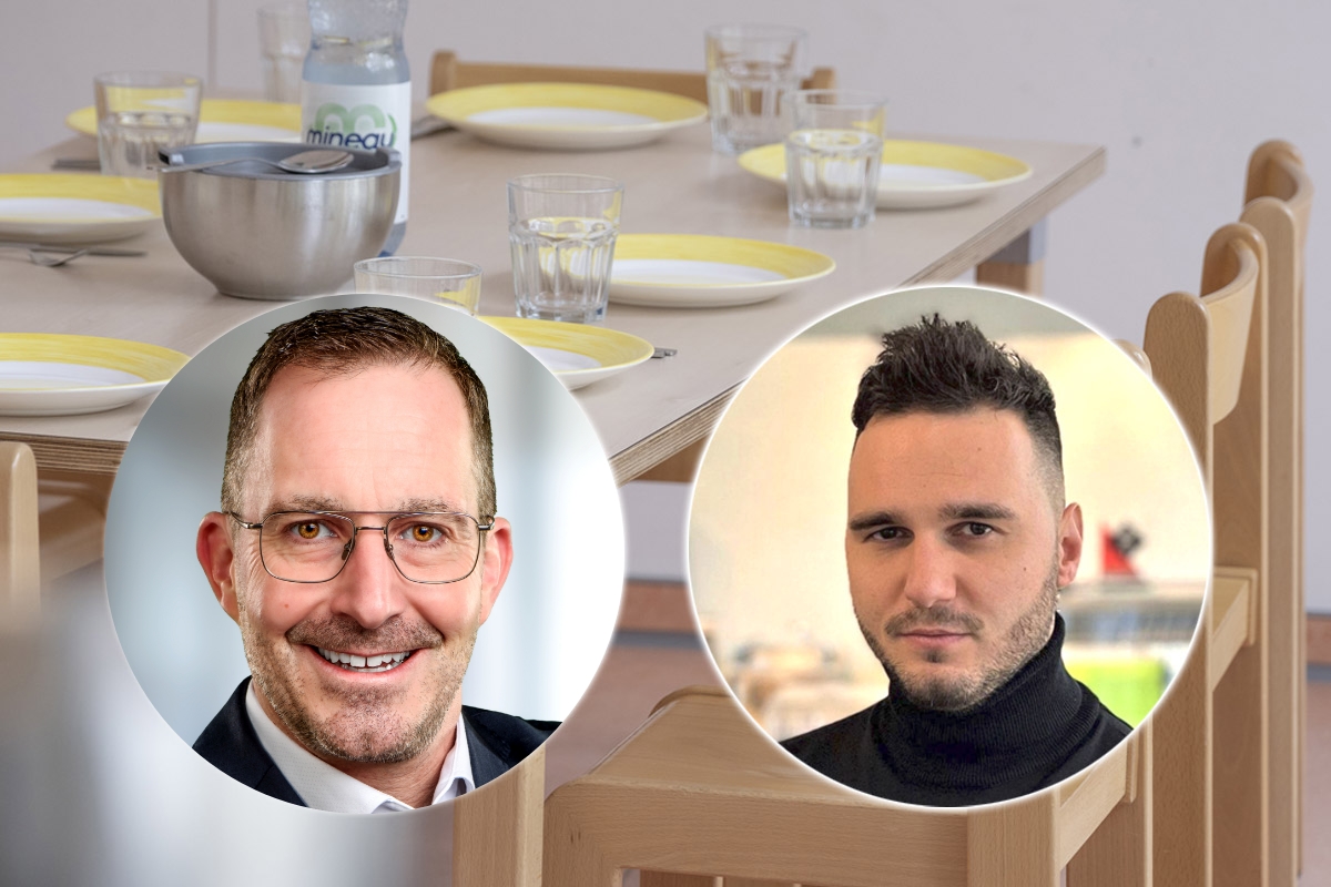 Patrick Hilpp und Stefan Mühlbauer von JUNIOR SERVE vor gedecktem Tisch als Ansprechpartner für Schulverpflegung ohne Küche
